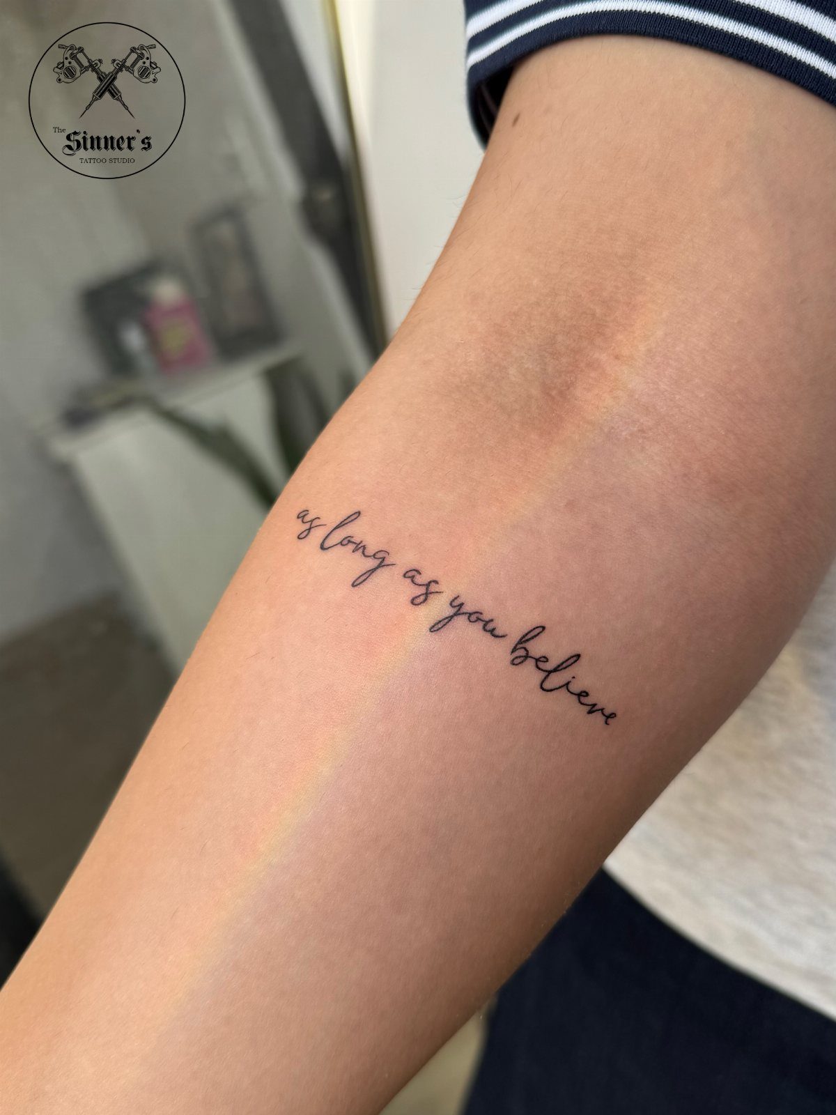 15 Small Tattoo Placement Ideas for Every Style 7 A small script tattoo reading as long as you believe on a person's inner arm.