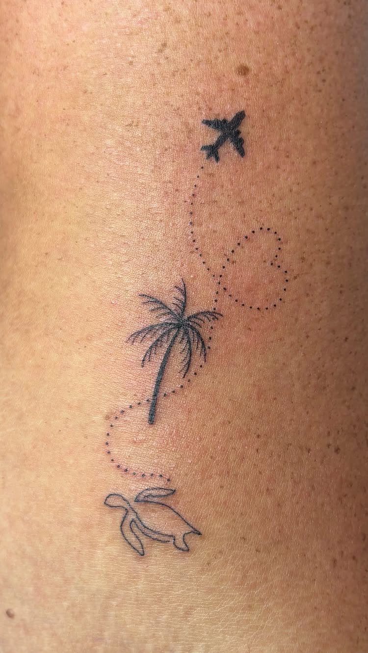 8 Tiny Travel Tattoo Ideas for Your Next Piece of Ink 6 Small black ink tattoos of a palm tree, airplane, and turtle on skin.